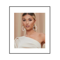 Witte kralen oorbellen met goud